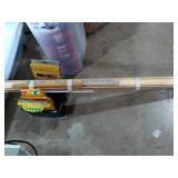 Small caddy of markers, bundle of yard sticks.