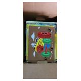 Box of wood puzzles  and books