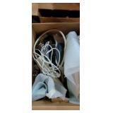 Group of clock, surge protector and books