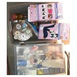 Two containers of sewing items