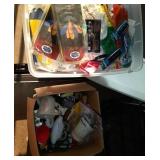 Two containers of household items one is a tote