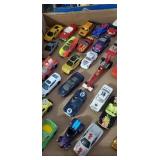 Flat of die-cast cars