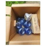 Box of assorted glass candleholders