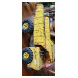 Metal tonka truck. Stands approx 10 inches tall