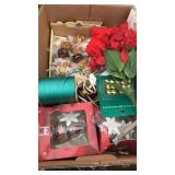 Box of Christmas towels, ornaments, candle,
