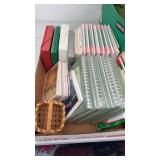 Box of cards and journals.  Small basket. Picture