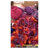 Box of yarn and material. One started project.