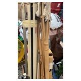 Tiki torches, tripod, shade, movie screen.