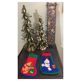 2 frosted trees, sled, and puppy stockings