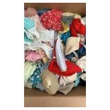 Box of baby doll clothes