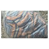 Bag of material and blanket