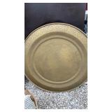 Large round gold colored metal wall decor