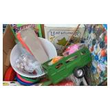 Box with metal toy trailer, puzzle, leaf press,