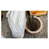 Flower pots, canopy tent cover, stakes.