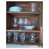 Contents of cabinet candle holders measuring cup