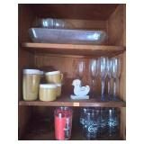 Contents of cabinet coke glasses baking dishes