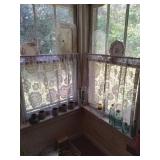 Everything in window bottles, mugs, plates misc