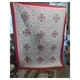 Hand sewn and embroidered pink heart quilt