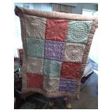 Hand quilted multi colored baby quilt