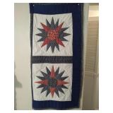 Hand sewn Dark blue sunburst style baby quilt