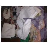 2 plastic totes of Assorted fabric