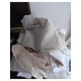 Plastic tote of Assorted linen and doilies