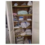Contents of linen closest, blankets, embroidered
