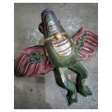 Flying wooden frogs