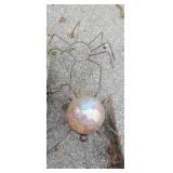 2 garden spiders and gazing ball