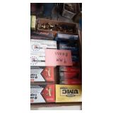 Boxes with empty brass 9mm cases Boxes with empty brass 9mm cases