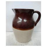 Pottery pitcher 8.5 " (  has chip) Pottery pitcher 8.5 " (  has chip)