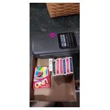 Playing cards, uno, and weather radio Playing cards, uno, and weather radio