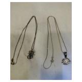 2 necklaces with charms both marked 925 2 necklaces with charms both marked 925