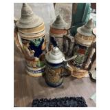 4 steins; 2 Germany, 1 Japan, 1 music box 4 steins; 2 Germany, 1 Japan, 1 music box