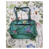 Anuschka purse shows wear