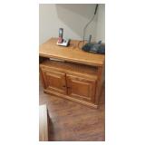 TV stand with phone, Linksys router and other