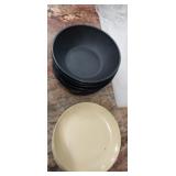 Plastic bowls and small plates