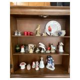 Contents of cabinet home decor pottery and