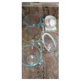 3 Pyrex measure cups and one plastic