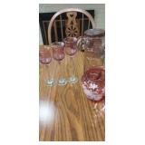 Purple glasses decanter with glasses and