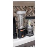 2 camp light lanterns and 1 Maglite flashlight