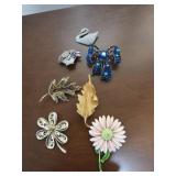 7 Brooches