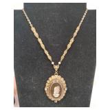 Vintage black and gold West Germany cameo