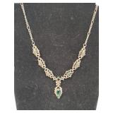 Necklace with green stones marked 18K GP