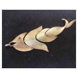 Gold tone fish pendant marked  Napier