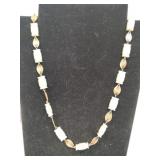 White and gold necklace material unknown