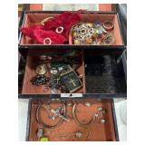 Music box with jewelry contents, some marked