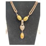 Green mcm beaded metal necklace