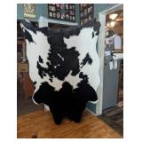 Faux fur cow print rug 4 ft by 6ft