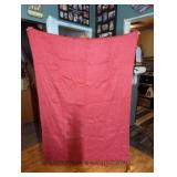 Rose colored fuzzy fleece throw. Not as red as
